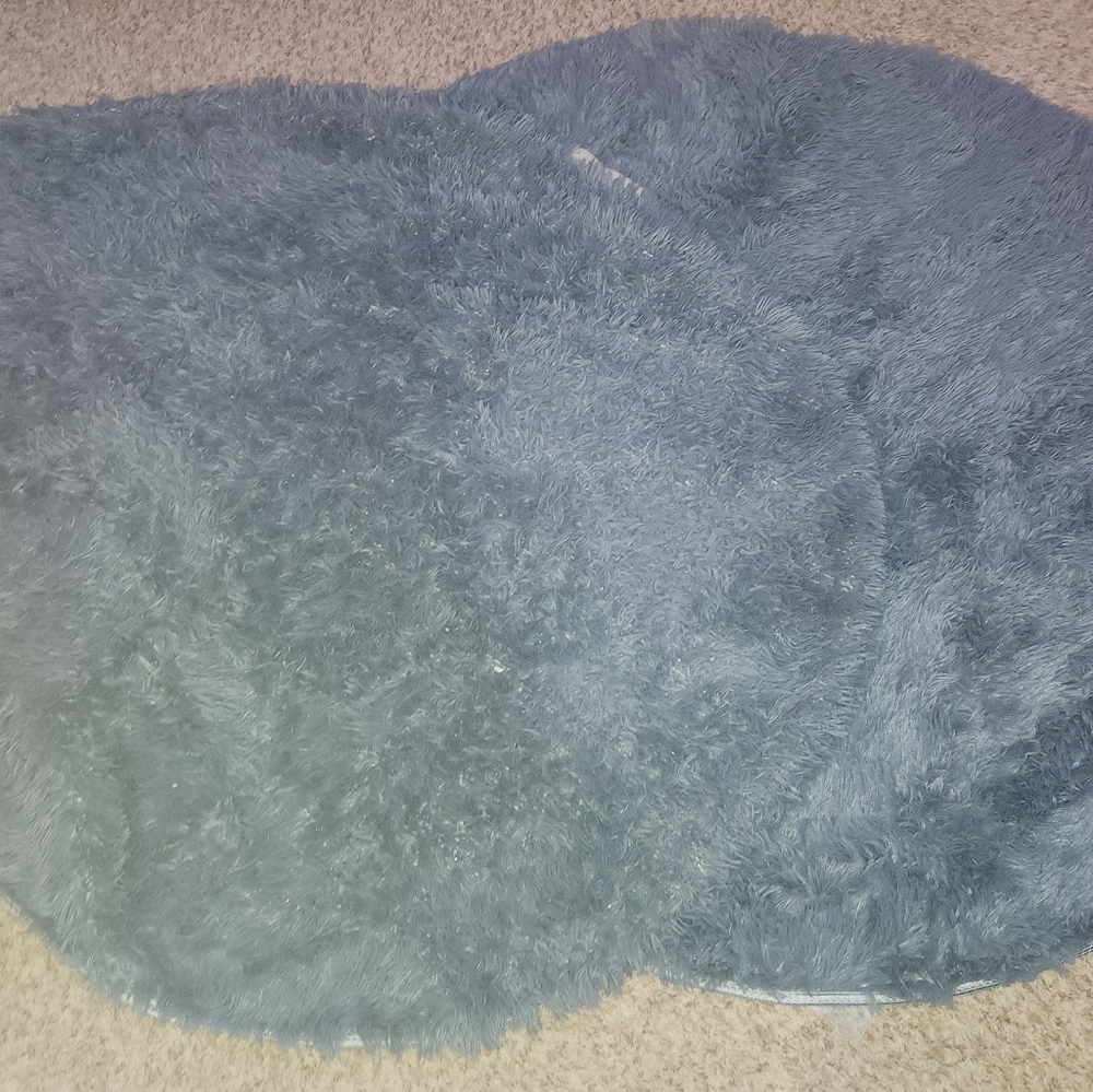 Grey round 57" rug